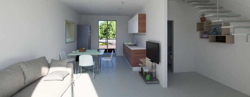 monolocale interno arredato primo piano soggiorno cucina e scala