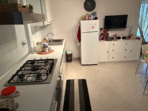 TRILOCALE CON CORTE ESCLUSIVA E POSTO AUTO